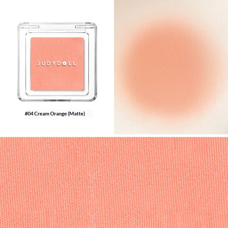 Judydoll Blush Powder #04 warm peach coral blush powder swatch for bright cheerful makeup finish